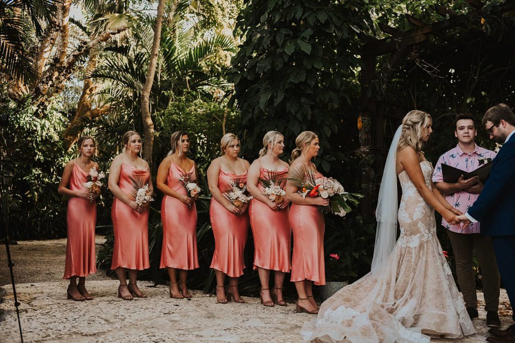 Bridesmaids at the alter at the historic walton house in homestead florida