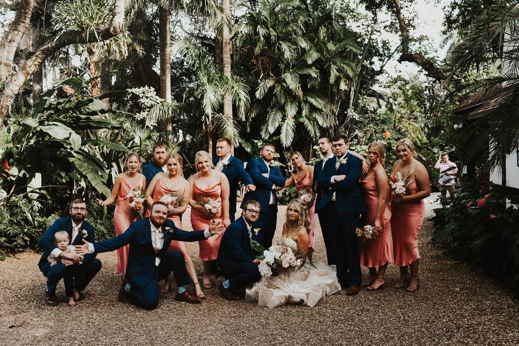 Tropical bridal party portrait at the historic walton house in homestead florida