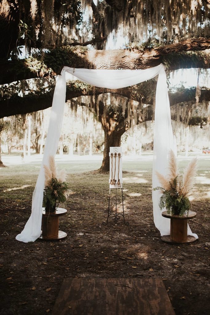 Oak tree arch for rustic ceremony décor for Okeechobee Florida wedding
