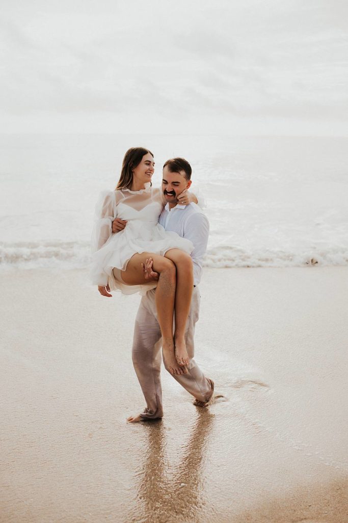 Bride and groom elopement on beach