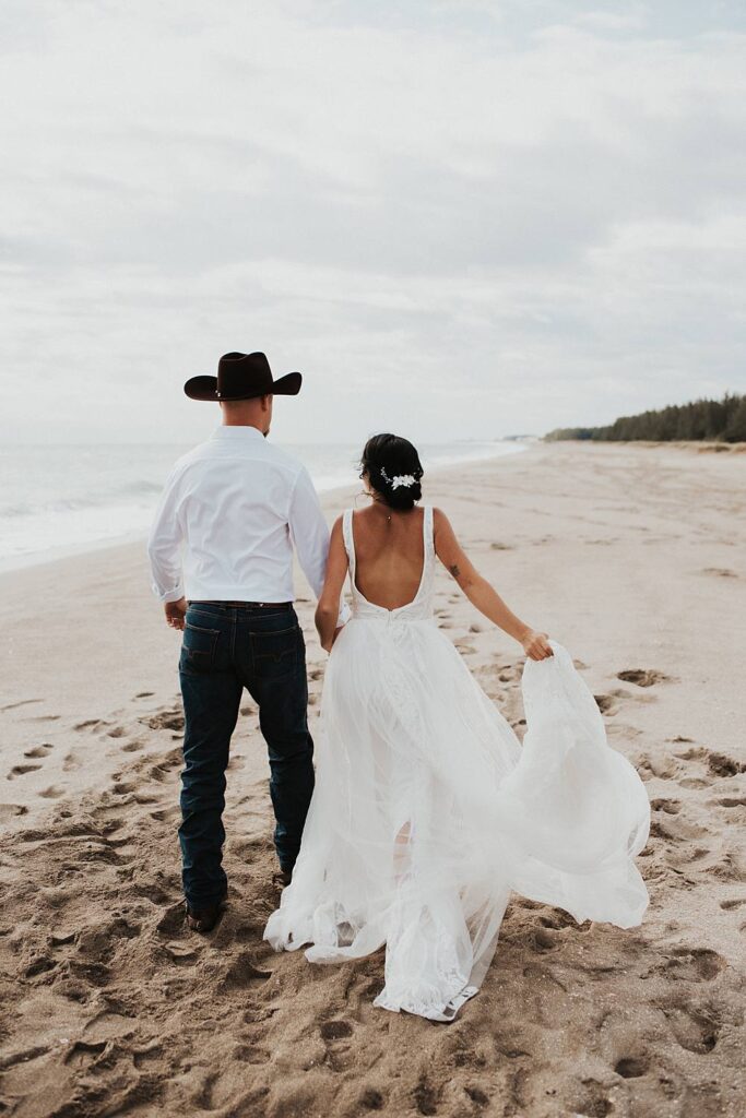 Bride and groom portraits on the beach after their Florida elopement