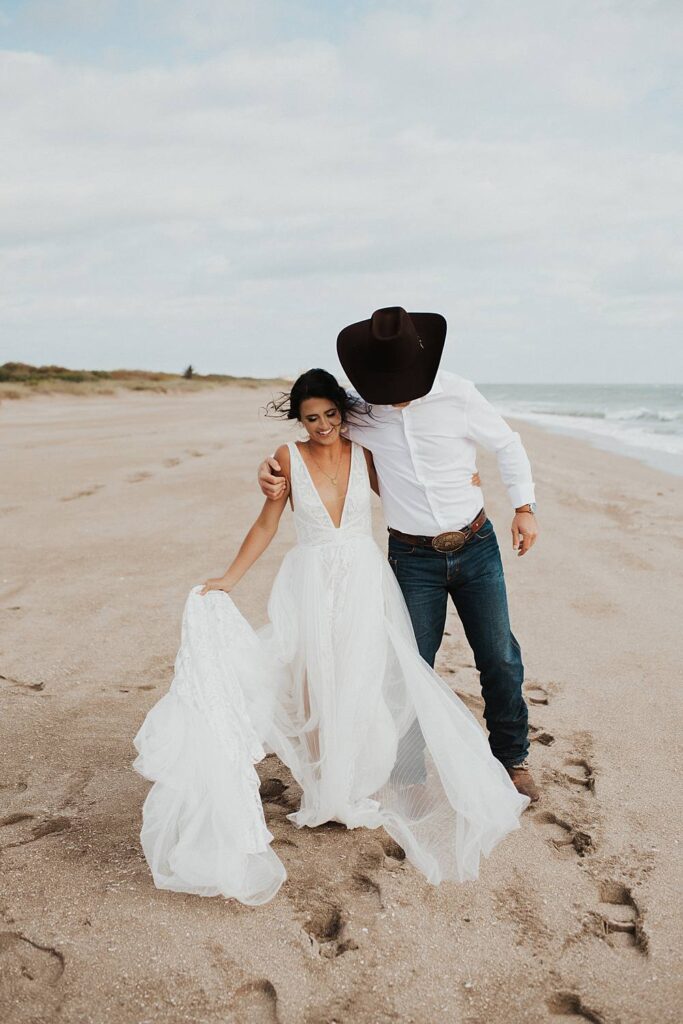 Bride and groom portraits on the beach after their Florida elopement